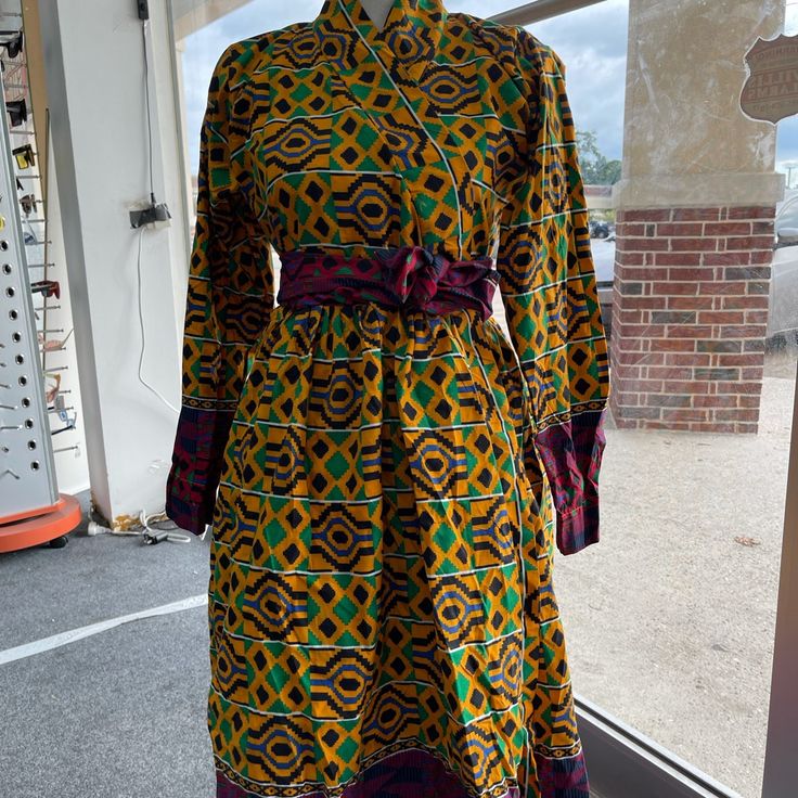 African Clothing For Women Ankara Kente Open Wrapping Dress With Pockets And Side Pockets Made With Poly Cotton Fabric Multicolor Dresses With Vibrant Print For Daywear, Multicolor Dress With Vibrant Print For Daywear, Fitted Yellow Long Sleeve Shirt Dress, Fitted Yellow Knee-length Shirt Dress, Fitted Long Sleeve Yellow Shirt Dress, Yellow Fitted Long Sleeve Shirt Dress, Fitted Multicolor Maxi Dress For Daywear, Fitted Multicolor Midi Shirt Dress, Fitted Multicolor Midi Length Shirt Dress