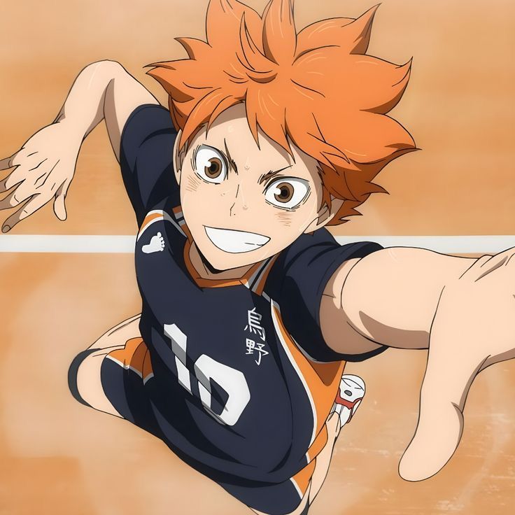 an anime character with orange hair is playing volleyball