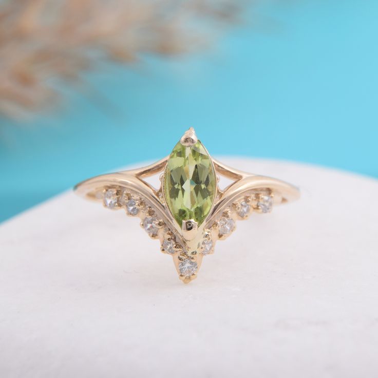 "Vintage style victorian womens wedding ring, Antique 14k solid yellow gold marquise cut green peridot engagement ring, Promise ring for her WE OFFER UNLIMITED PERIOD INSTALLMENTS PLAN This is a beautiful, stunning, feminine ring that works well for all occasions, styles, and ages. You will love it! Ring information Main stone: Peridot Approximate size: 8x4mm Accent stones: White cubic zirconia Approximate size: 1.5mm (5 stones) Approximate size: 1.25mm (4 stones) Metal type: Gold Metal stamp: 1 Classic Marquise Cut May Birthstone Jewelry, Classic Marquise May Birthstone Jewelry, Classic Marquise Jewelry For May Birthstone, Formal Marquise Cut May Birthstone Jewelry, Fine Jewelry Marquise May Birthstone Ring, Marquise Cut Diamond Ring For May Birthstone, Green Marquise Diamond Ring For Formal Events, Elegant Marquise Cut May Birthstone Rings, Green Marquise Diamond Ring For Formal Occasions