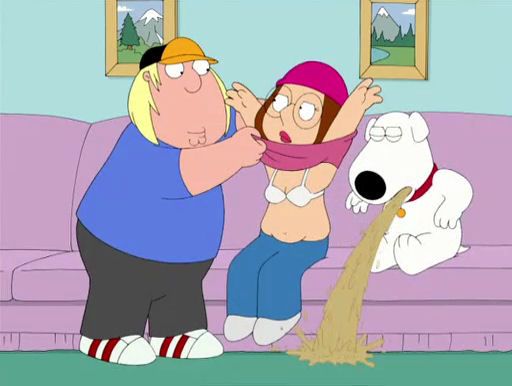 the family guy and his dog are playing with each other in front of a couch