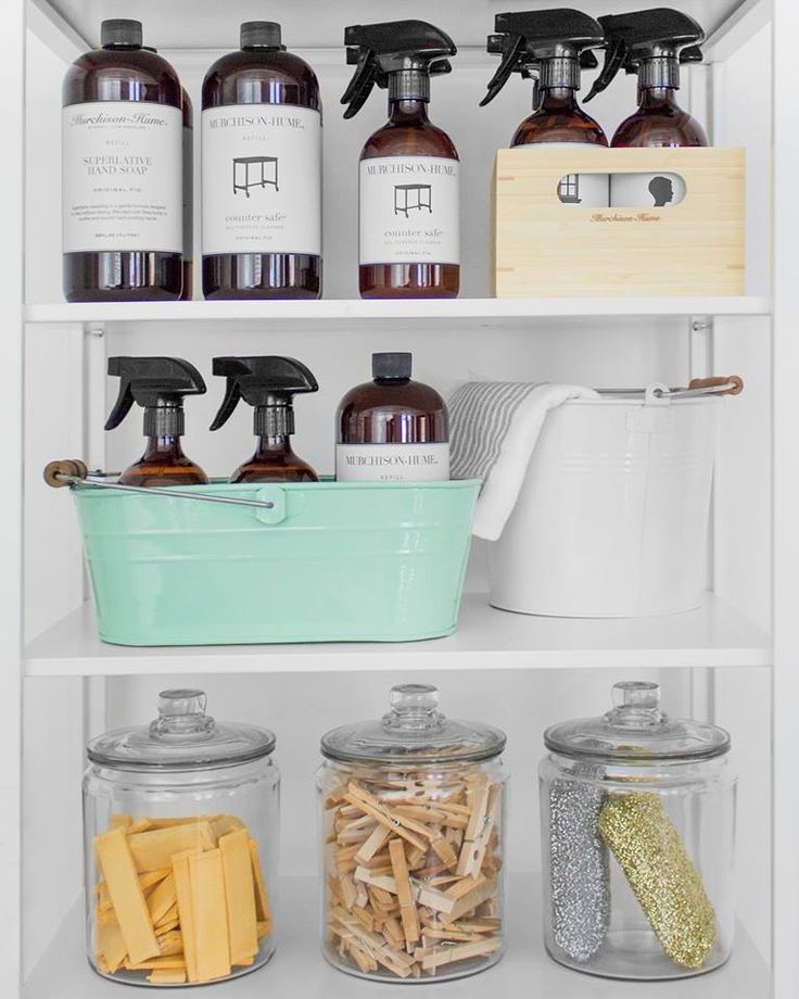 an open refrigerator filled with lots of different types of household cleaning products and bottles on top of the shelves