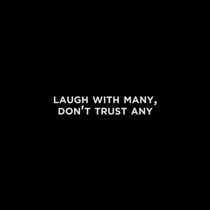 the words laugh with many, don't trust any in white on a black background