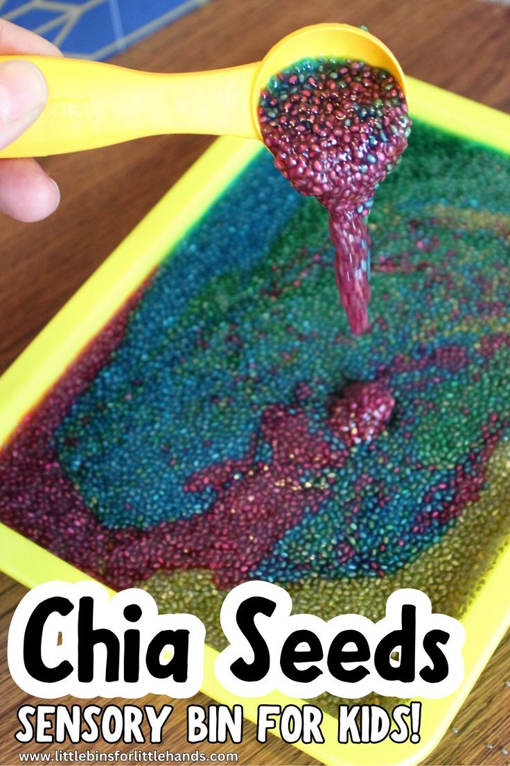 a person pouring colored seed mixture into a yellow tray with the words chia seeds on it