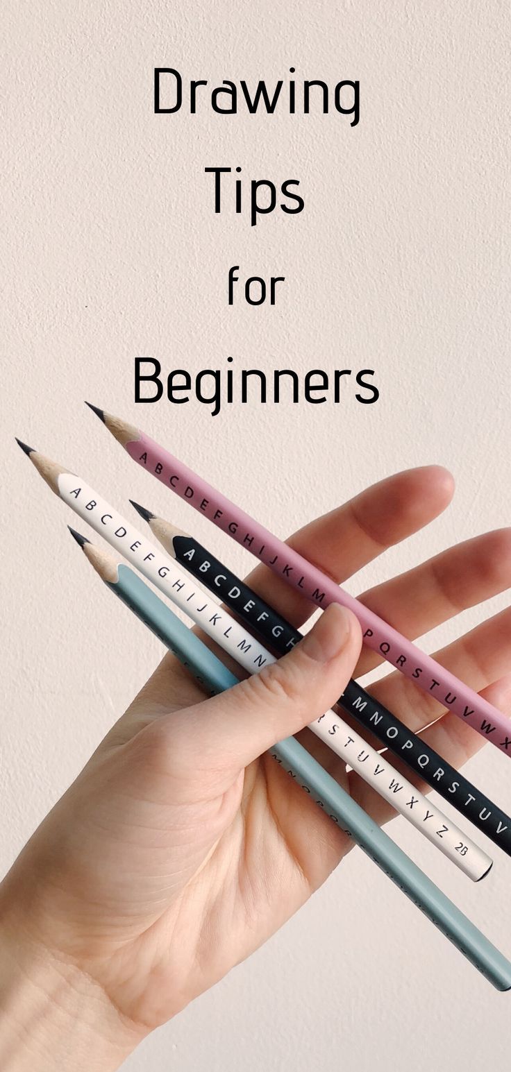 a hand holding four pencils with the words drawing tips for beginners written on them