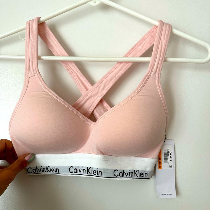 Calvin Klein Women's Modern Cotton Padded Bralette Size Small Baby Pink / Light Pink Color Never Worn Pink Seamless Sports Bra For Loungewear, Pink Seamless Bra For Spring, Fitted Pink Bra For Loungewear, Pink Sports Bra For Loungewear In Spring, Pink Sports Bra For Spring Loungewear, Casual Stretch Pink Bra, Spring Seamless Pink Sports Bra, Spring Pink Sports Bra, Manifestation List