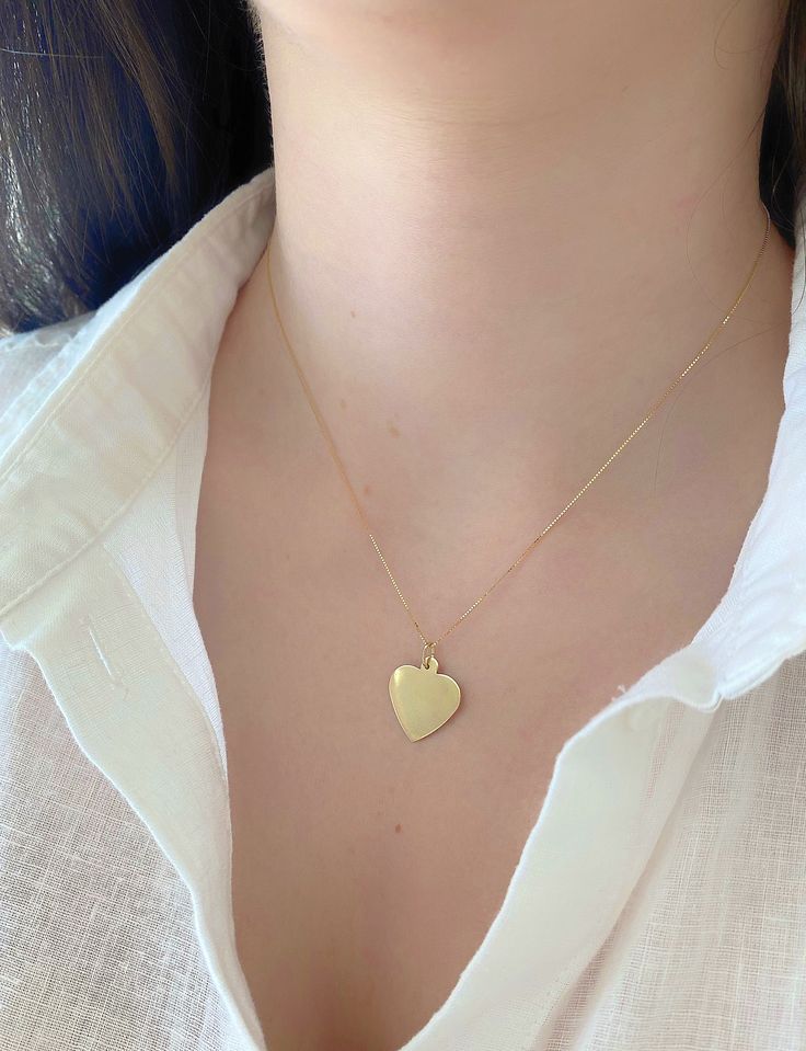 "Dainty And Elegant 14K Yellow Gold Heart Pendant Charm. This Minimalist Pendant Will Be A Great Addition To Any Other Jewelry Your Wear On Your Neck. Charm Is Sturdy And Solid And Comes With The Option Of A High Quality Box Chain That Feels Very Silky. A Beautiful Gift She Will Treasure Forever! Jewelry Comes In A Cute Gift Box Ready To Present. Model Is Wearing A 16\" Chain. -Chain Is Additional, Look At The Length Options - All Jewelry Is New And Inspected For Quality Assurance. -Jewelry Is C Everyday Yellow Gold Heart Charm Necklace, 14k Gold Heart Necklace For Everyday Wear, 14k Gold Everyday Heart Necklace, Everyday Yellow Gold Heart Necklace With Heart Charm, Everyday Yellow Gold Heart Necklace With Heart Detail, Everyday 14k Gold Heart Cut Necklace, Everyday 14k Gold Heart Necklace, Everyday Yellow Gold Heart Necklace, Yellow Gold Heart Cut Necklace Stamped 14k