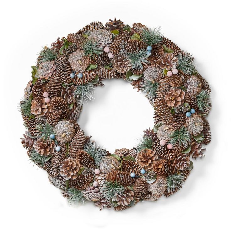 a christmas wreath with pine cones and evergreens on it, measurements for the size