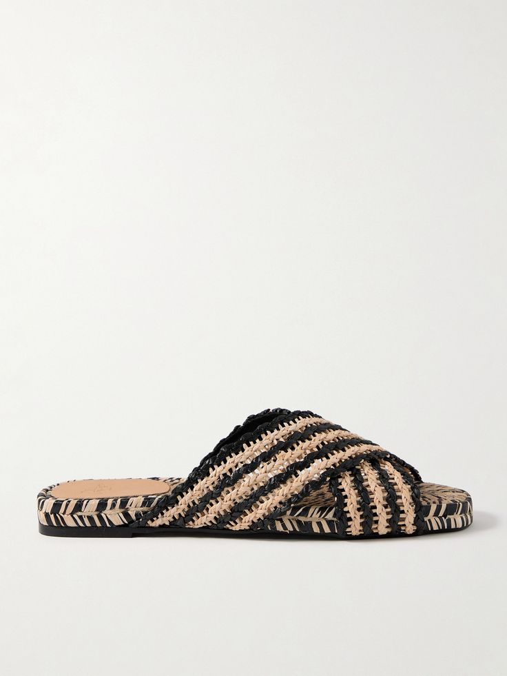 Castañer's 'Pat' slides are set on the same jute soles as the brand's signature espadrilles - they're woven on a one-of-a-kind machine created by founder Tomás Serra himself. Handcrafted from two-tone raffia, they have crisscrossing straps and leather pads at the heels for comfort. Slip-on Espadrilles With Textured Footbed For Vacation, Vacation Espadrilles With Textured Footbed And Straw Material, Natural Espadrilles With Textured Footbed For Vacation, Natural Color Espadrilles With Woven Sole For Vacation, Straw Summer Espadrilles With Textured Sole, Vacation Straw Espadrilles With Textured Footbed, Beach Espadrilles With Textured Footbed In Natural, Natural Straw Espadrilles With Cushioned Footbed, Beach Espadrilles With Textured Footbed