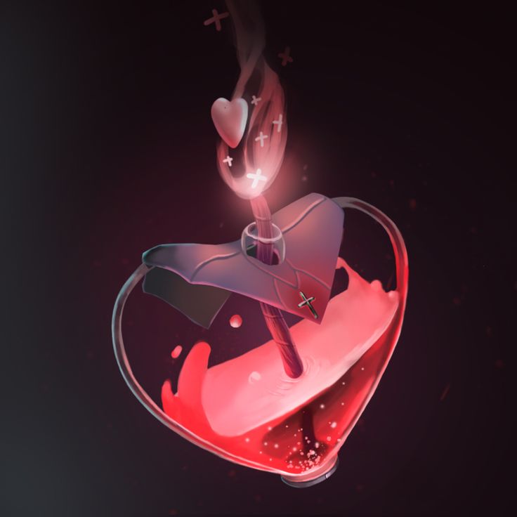 a heart - shaped object is floating in the air with liquid pouring out of it