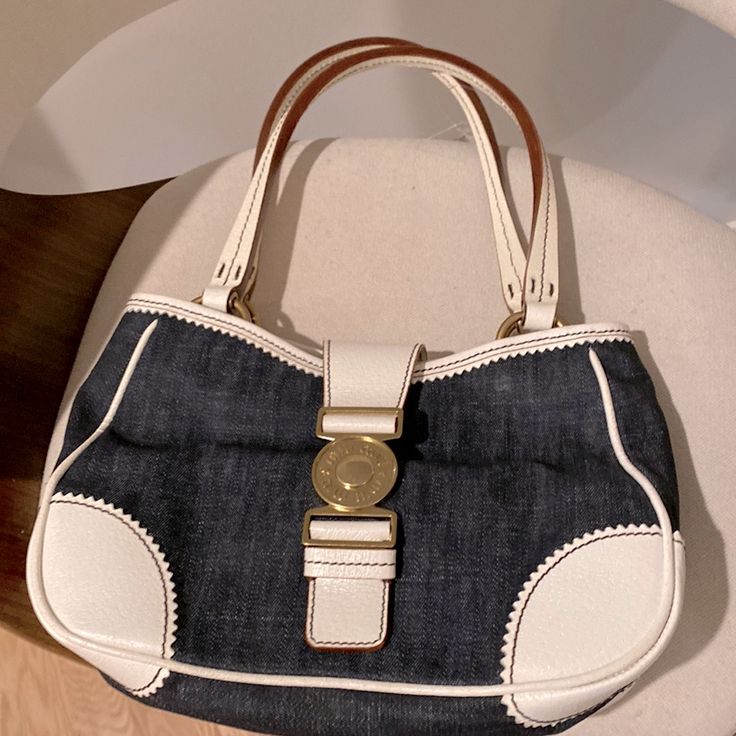 Never Used, Or Taken Out Of Its Bag. Brand New. Mint Condition. Not A Single Mark Or Scratch. Very Well Preserved. Comes With Bag. Totally Matches My Manolo Booties. Check Out My Closet Designer Everyday Bags In Denim Blue, Designer Denim Blue Shoulder Bag For Everyday, Designer Denim Blue Shoulder Bag, Everyday Denim Bags With Gold-tone Hardware, Denim Bags With Gold-tone Hardware For Everyday Use, Chic Everyday Miu Miu Bags, Chic Everyday Miu Miu Shoulder Bag, Classic Denim Bag For Everyday Use, Elegant Denim Blue Bag For Everyday Use