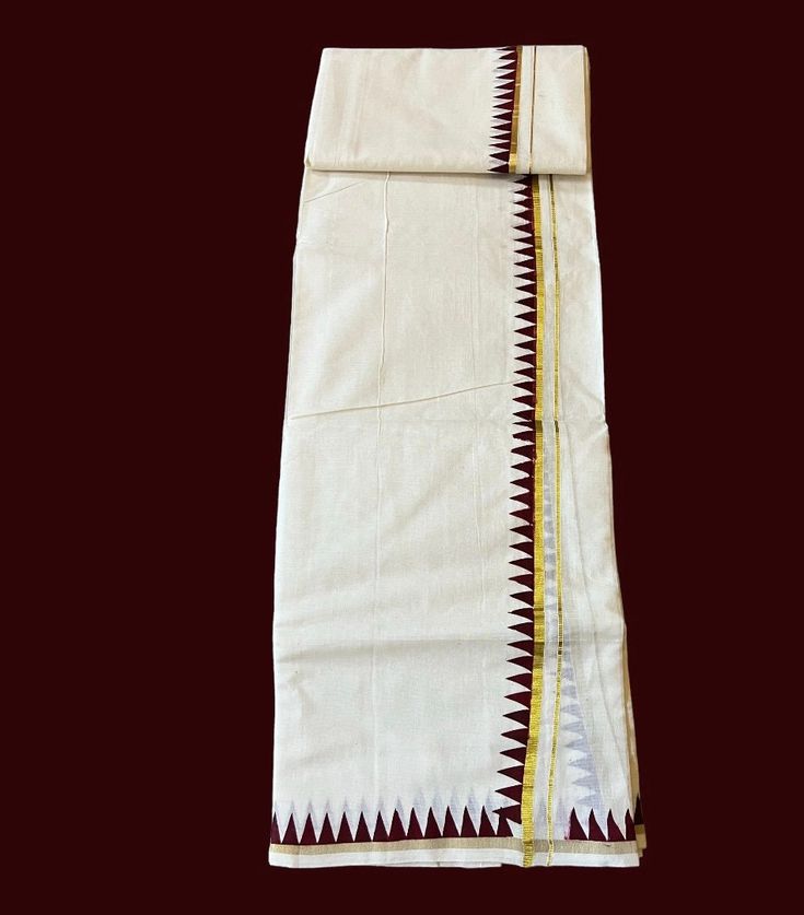 Kerala Traditional kasavu saree and mundu.single mundu.  Color: Maroon White Handloom Traditional Wear For Ceremonial Occasions, White Handloom Traditional Wear For Ceremonial Use, White Kurta With Printed Border For Diwali, Bollywood Style White Dupatta For Rituals, Traditional White Sets With Printed Border, White Sets With Printed Border For Navratri, Ceremonial Handloom Sets For Diwali, Ceremonial White Handloom Traditional Wear, White Traditional Wear For Diwali Rituals