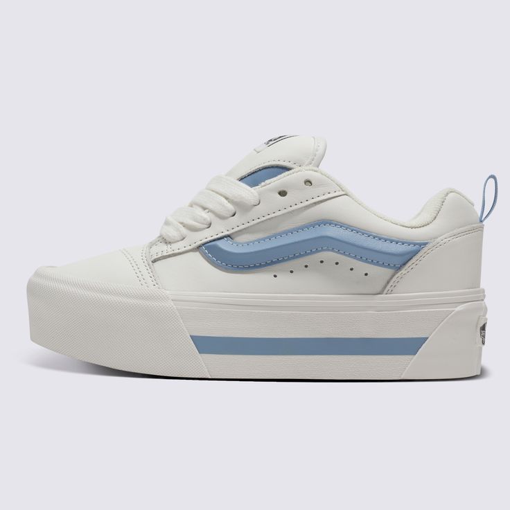 A Puffy 90s Style with a Chunky Platform OutsoleThe Knu Stack starts with our modern interpretation of a classic 90s silhouette—and then cranks it up a notch. With double the height, a puffed up tongue, and a 3D-molded Sidestripe, this in-your-face shoe boasts dramatic style details that blend an icon of the past with today’s bold trends. Reissued 90s low-top shoe 34 mm platform height Sturdy leather uppers Puffy tongue and ankle collar Puffy 3D molded Sidestripe™ Oversized chunky laces Signature rubber waffle outsoles | Vans Knu Stack Shoes (Smarten Up White/Blue) - 3.5 Boys/5.0 Women Retro Synthetic Skate Shoes With Vulcanized Sole, Vans Chunky Shoes, Retro Skate Shoes With Cushioned Footbed And Round Toe, Retro Skate Shoes With Cushioned Footbed, Retro Synthetic Skate Shoes With Cushioned Footbed, Retro Vans Skate Shoes With Round Toe, Vans Sk8 High Stacked, Casual Platform Vans Skate Shoes, Vans Synthetic Round Toe Skate Shoes