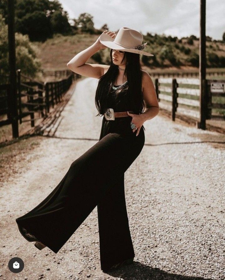 Jumpsuit With Boots Western, Cowgirl Wedding Outfit Guest Formal, Country Outfits Wedding Guest, Outfits With Black Cowboy Boots For Women, Western Black Outfits Women, Black Western Jumpsuit, Western Wedding Attire For Women, Texas Wedding Outfit Guest, Country Western Wedding Guest Dresses