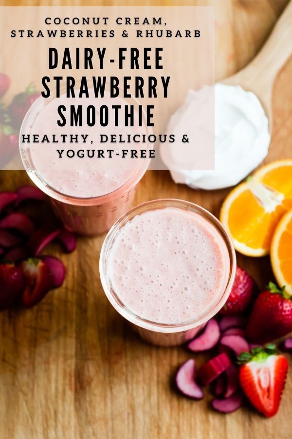 dairy - free strawberry smoothie with yogurt and strawberries on the side