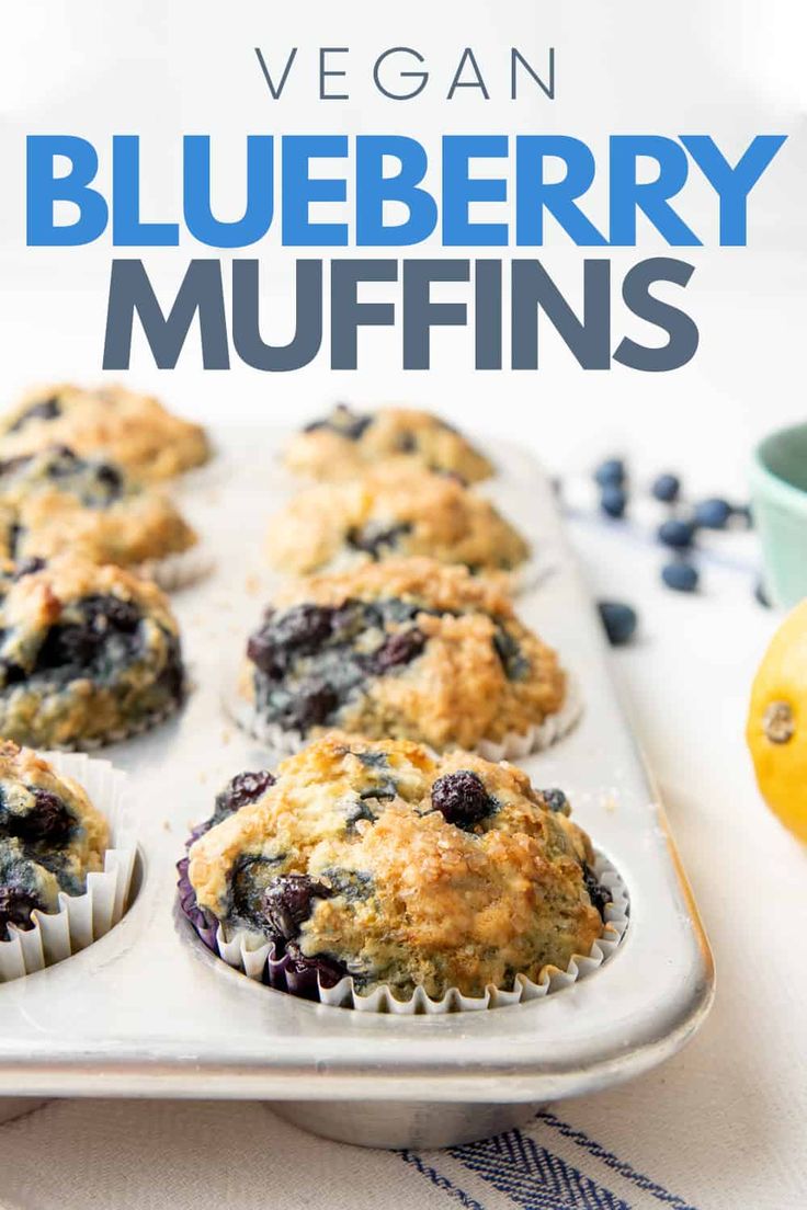 blueberry muffins in a muffin tin with the title vegan blueberry muffins