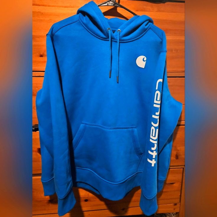 Women's 2xl Carhartt Blue Hoodie With Print On Lefted Sleeve. Brand New With Tag. Carhartt Hoodies, Carhartt Sweater, Carhartt Sweatshirts, Carhartt Hoodie, Carhartt Shirts, Carhartt Womens, Carhartt Women, Blue Sweatshirt, Blue Hoodie