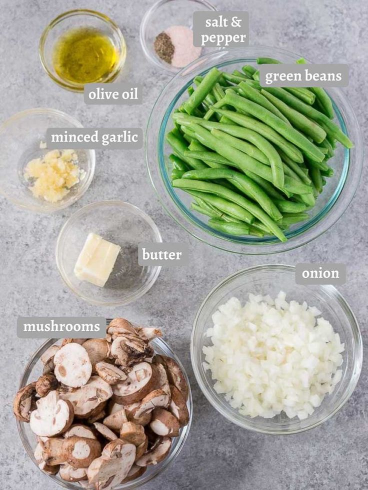 the ingredients for green beans and mushrooms in bowls