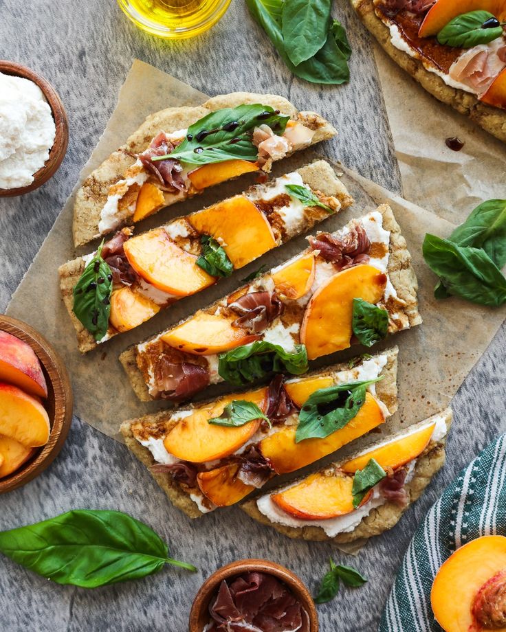 sliced peaches and goat cheese on pita bread