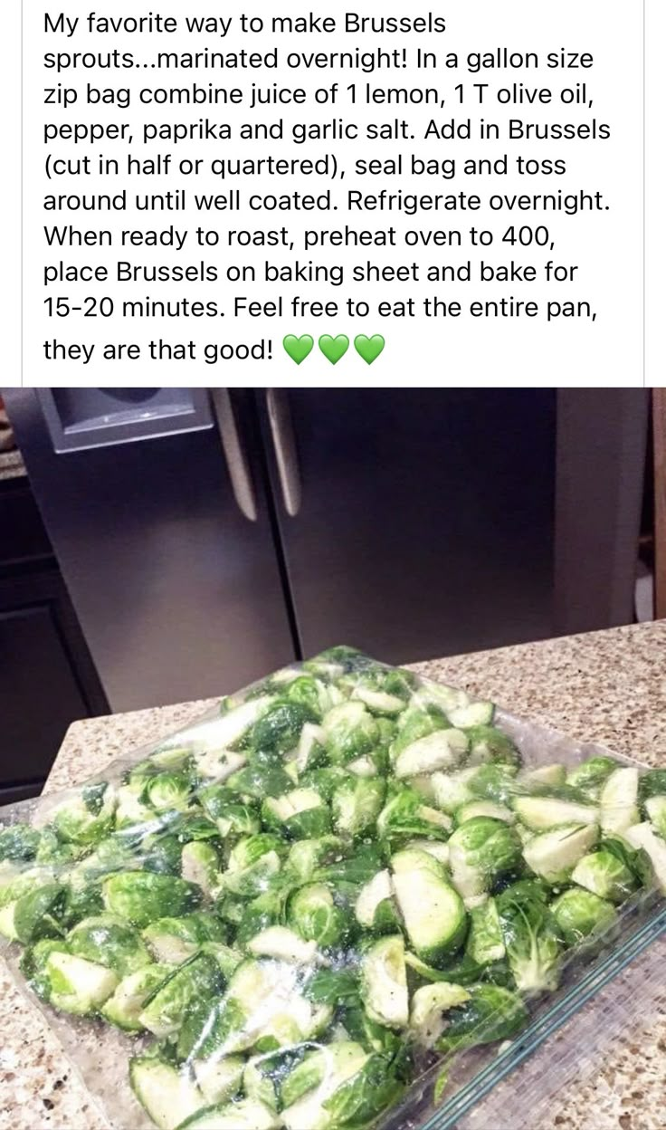 a glass baking dish filled with brussel sprouts on top of a counter