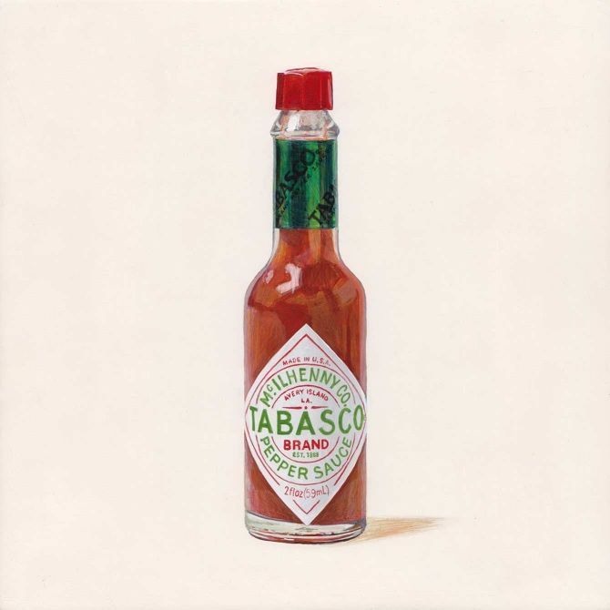 a bottle of tabasco on a white background