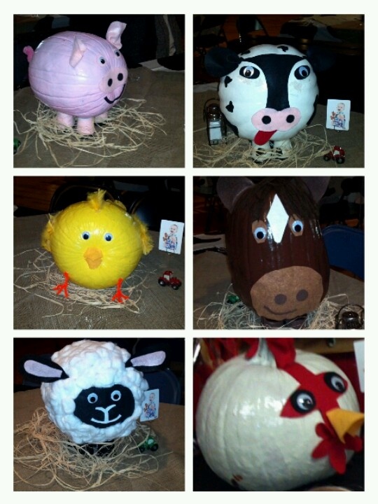 four different types of farm animals made out of pumpkins and paper mache heads