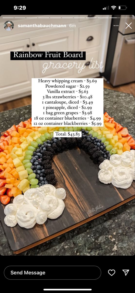 the rainbow fruit board is made out of grapes and carrots