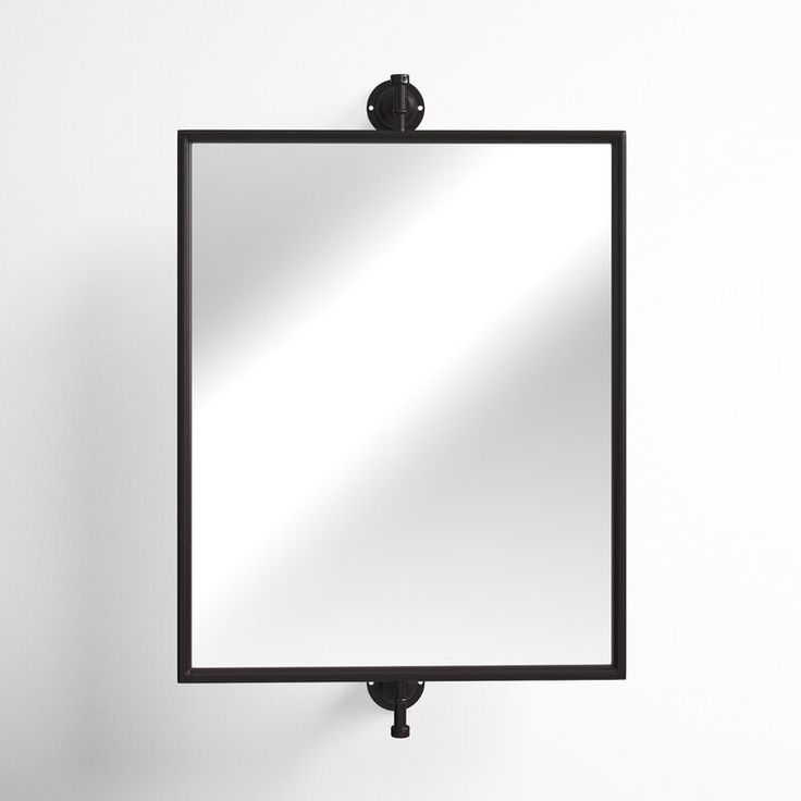 a square mirror hanging on the wall