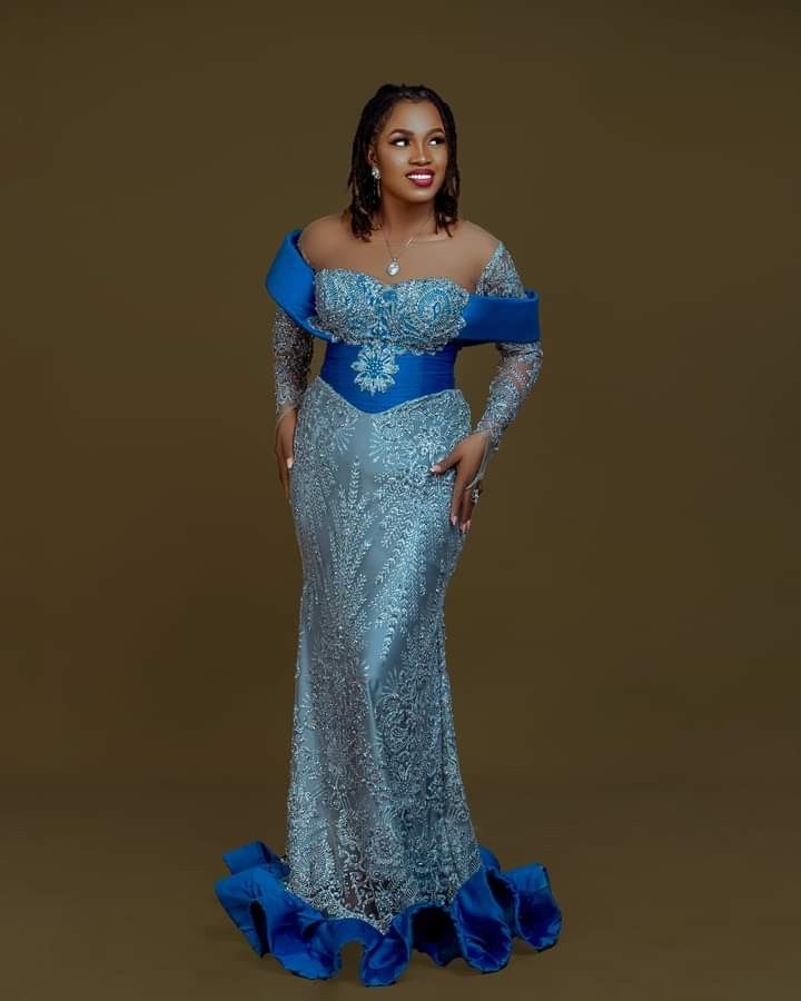 Navy Blue Asoebi Lace Styles In Nigeria, Navy Blue Asoebi, Blue Asoebi Lace Styles, Blue Asoebi, Corset Asoebi Styles, Corset Asoebi, Asoebi Lace Styles, Asoebi Lace, Black Bridal Makeup