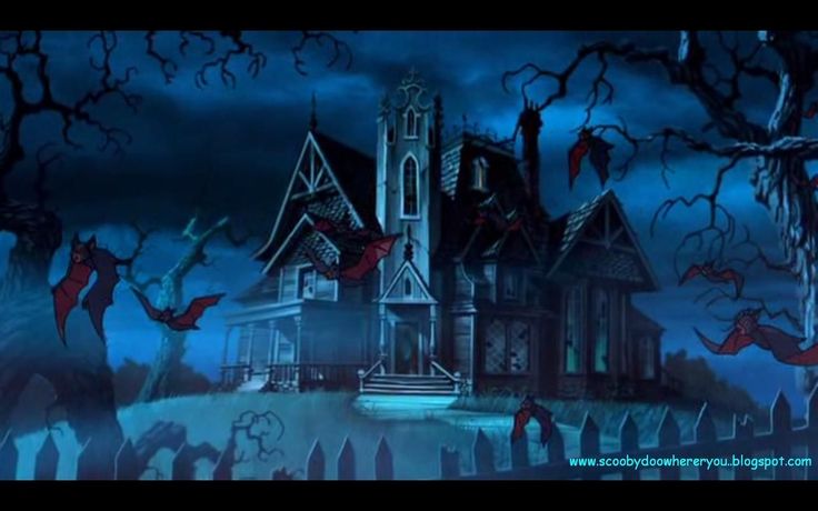 a creepy house with bats flying around it