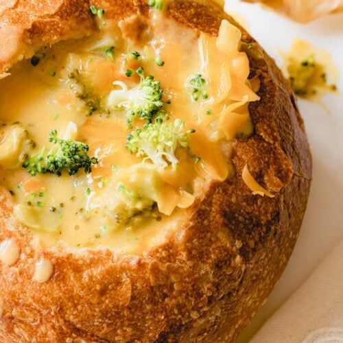 broccoli and cheese soup in a bread bowl