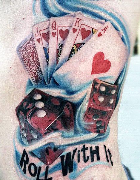 a man's back with playing cards and dices on his stomach that says roll with it