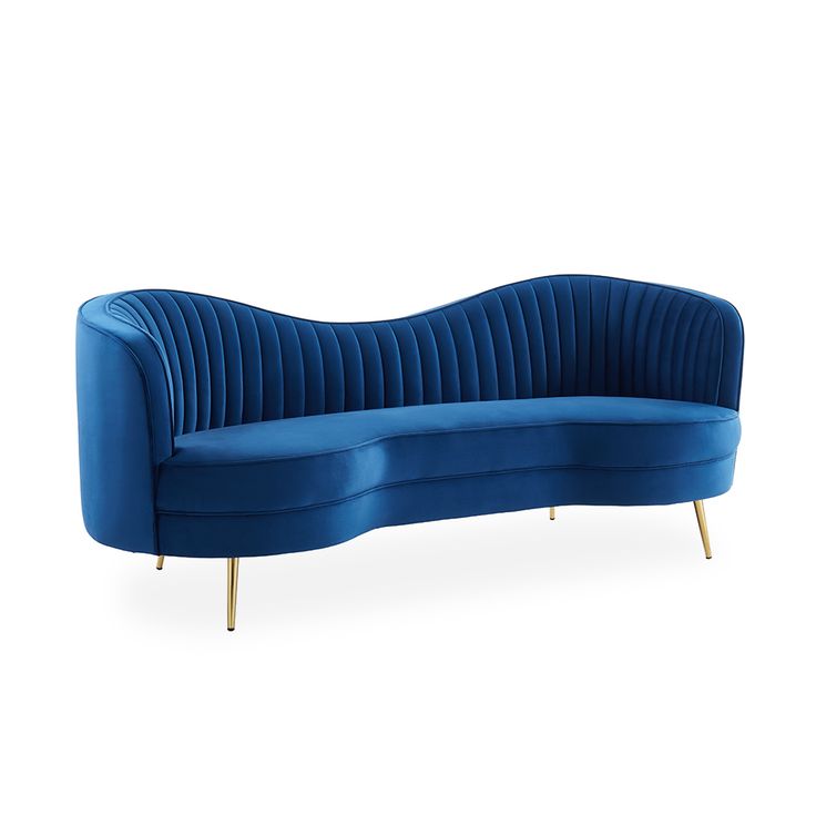 a blue couch sitting on top of a white floor