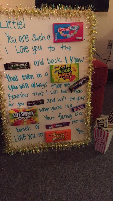 a bulletin board with candy bars on it