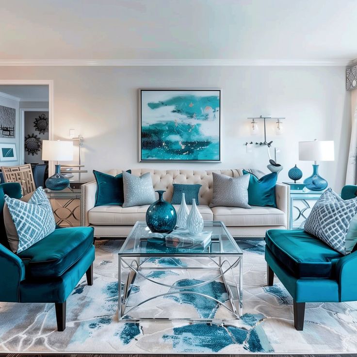 a living room filled with blue and white furniture