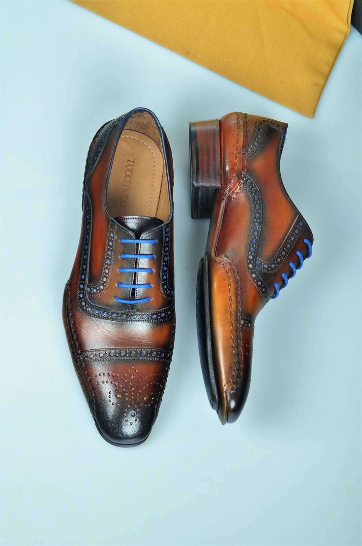 Special Edition TucciPolo Brown & Blue Prestigiously Designed HandWelted Oxford Mens Luxury Shoes - offering superior comfort and exquisite design. Shop TucciPolo Collection of top quality mens Luxury Handmade Italian leather designer Shoes. Leather : Hand polish Italian Leather Sole: Double Leather Sole Construction: Specially Crafted Oxford hand welted sole & sides Stitched Color: Brown & Blue This is a made-to-order product. Each pair will be made upon receipt of order and shipped Luxury Footwear, Italian Leather Shoes, Mens Luxury, Well Dressed Men, Shoes Leather, Mens Oxfords, Exquisite Design, Luxury Shoes, Italian Leather