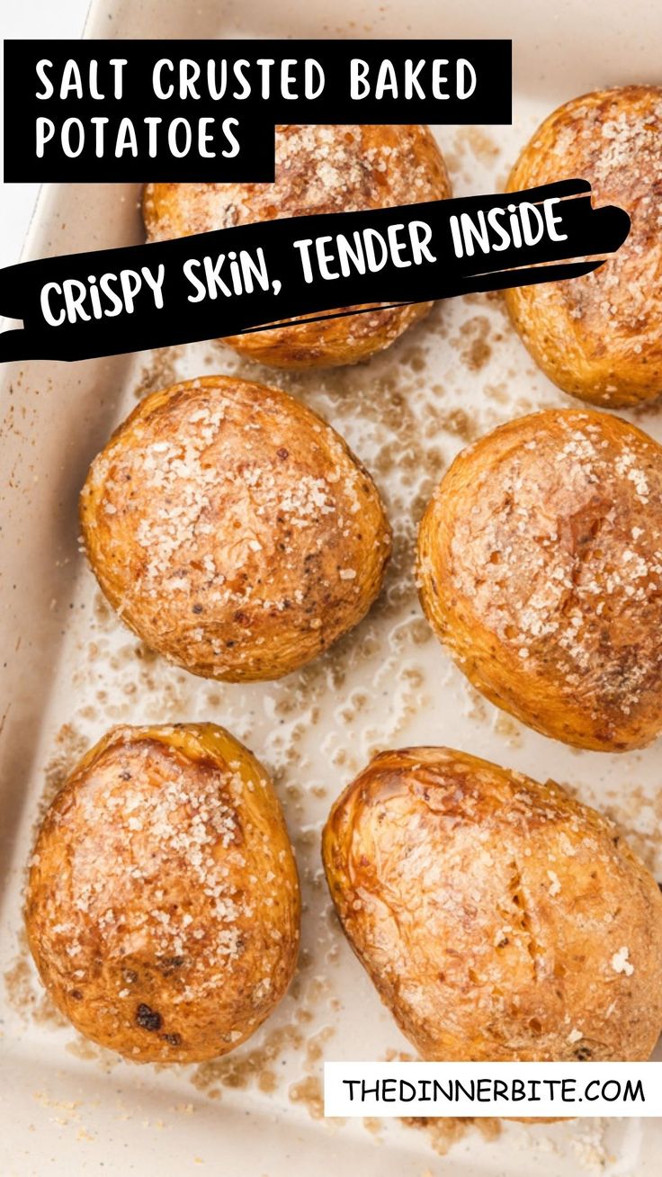 several baked goods in a baking pan with text overlay saying salt crusted baked potatoes crispy skin, tender inside