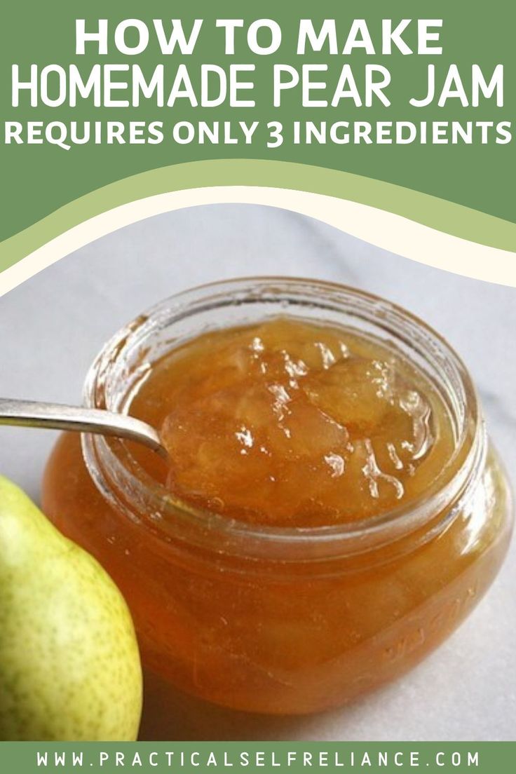 a jar filled with homemade pear jam next to an apple