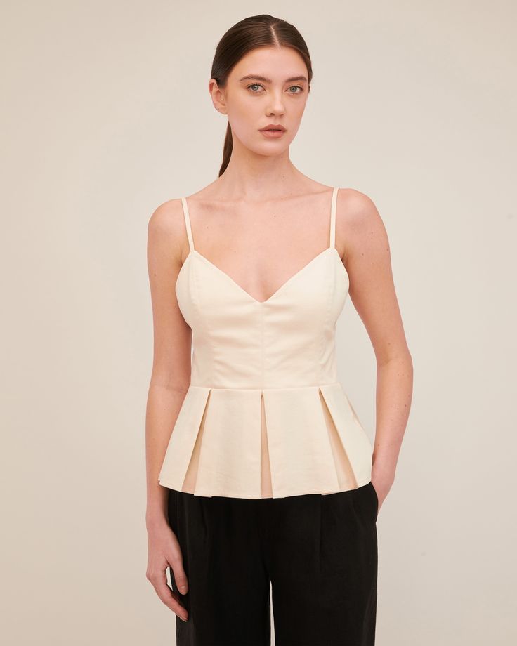 Emily Pleated Peplum Top | MARISSA WEBB Fitted Pleated Top For Day Out, Formal Peplum Tops For Spring, Chic Sleeveless Top With Fitted Bodice, Chic Fitted Bodice Sleeveless Tops, Chic Peplum Tops For Formal Occasions, Formal Summer Peplum Top, Chic Formal Peplum Tops, Fitted Pleated Tops, Chic Pleated Waist Spring Tops