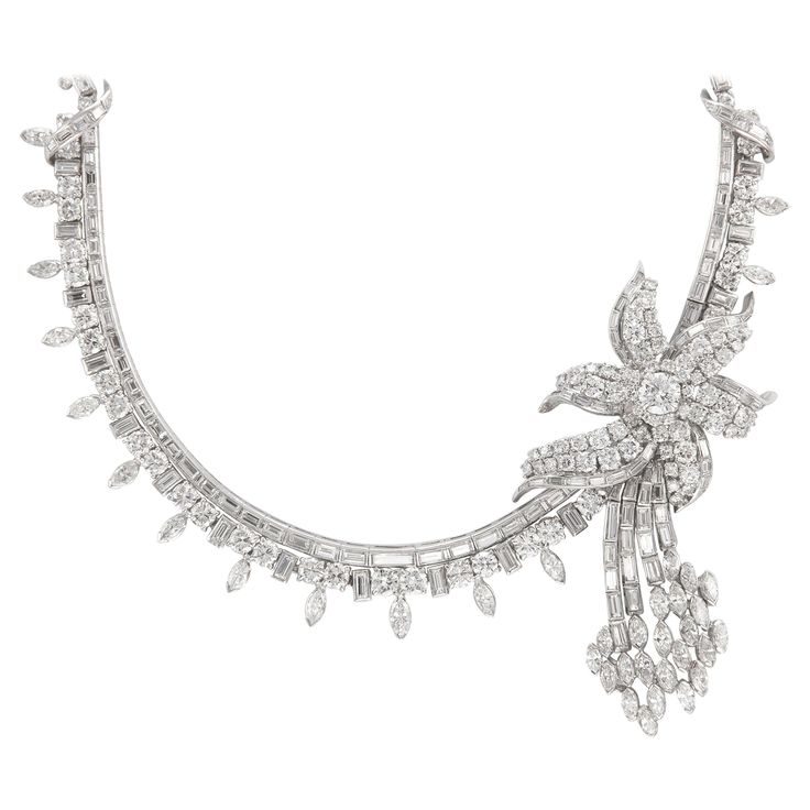 Important exquisite grand diamond floral necklace platinum, high jewelry circa 1950's. 354 total diamonds, approximately 60 carats total. 146 round diamonds approximately F/G color and SI clarity. 169 baguette diamonds F/G color and VS clarity. 39 marquise diamonds approximately FG color SI clarity. Accommodated with an up-to-date appraisal by a GIA G.G. once purchased, upon request. Please contact us with any questions. Item Number N3711 Antique Diamond Necklace, Modern Diamond Jewelry, Drop Necklaces, Diamond Drop Necklace, Pearl Drop Necklace, Pearl And Diamond Necklace, Heart Necklace Diamond, Diamond Necklace Set, Vintage Necklaces