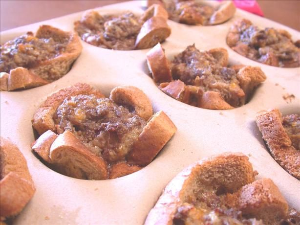 a muffin tin filled with lots of different types of food