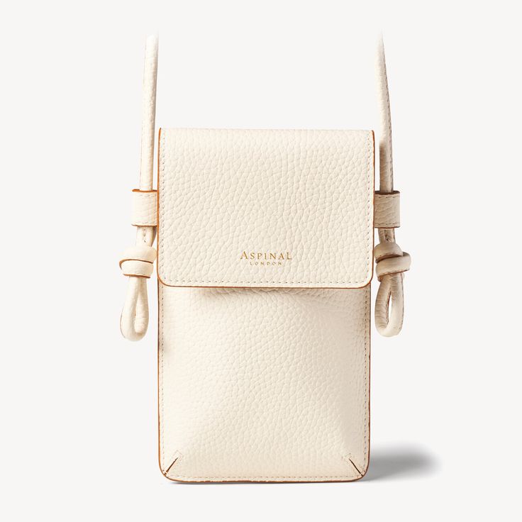 Ella Phone Pouch in Ivory Pebble | Aspinal of London Chic Soft Leather Phone Bag For Travel, Luxury Everyday Phone Bag With Adjustable Strap, Leather Crossbody Phone Bag With Hidden Sleeve, Beige Leather Phone Bag With Detachable Strap, White Leather Phone Bag With Removable Pouch, Beige Crossbody Phone Bag With Card Slots, Leather Crossbody Phone Bag With Card Slots, Beige Leather Phone Bag With Removable Pouch, Beige Leather Crossbody Phone Bag