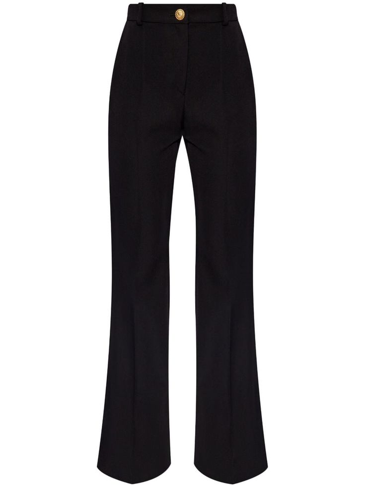 black virgin wool high-rise flared hem front button and zip fastening belt loops slip pockets to the sides pressed crease The crease-effect on this piece is very much intentional, no ironing necessary. Balmain Trousers, Balmain Pants, Uzun Boy, Black Fr, Fantasy Gowns, Yoko London, Wool Trousers, Wool Pants, Edgy Outfits