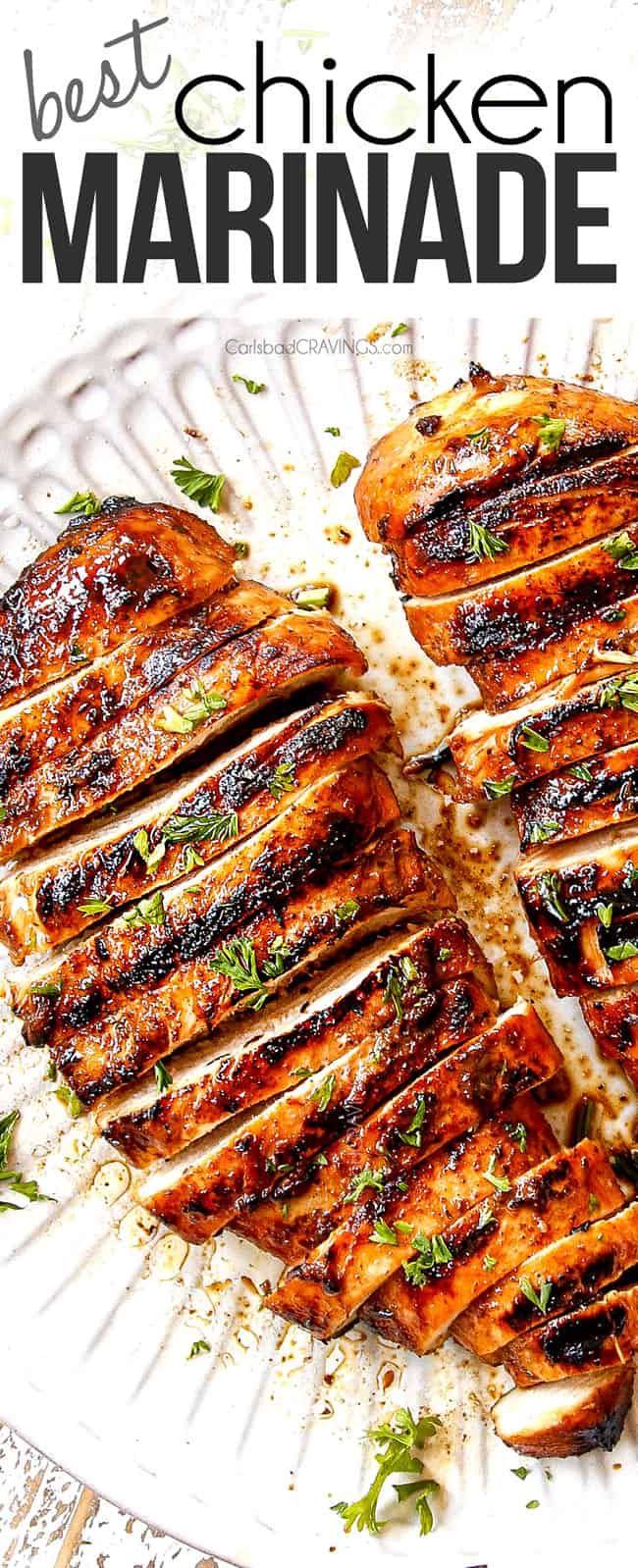 grilled chicken marinade on a white plate with parsley sprinkled around the edges