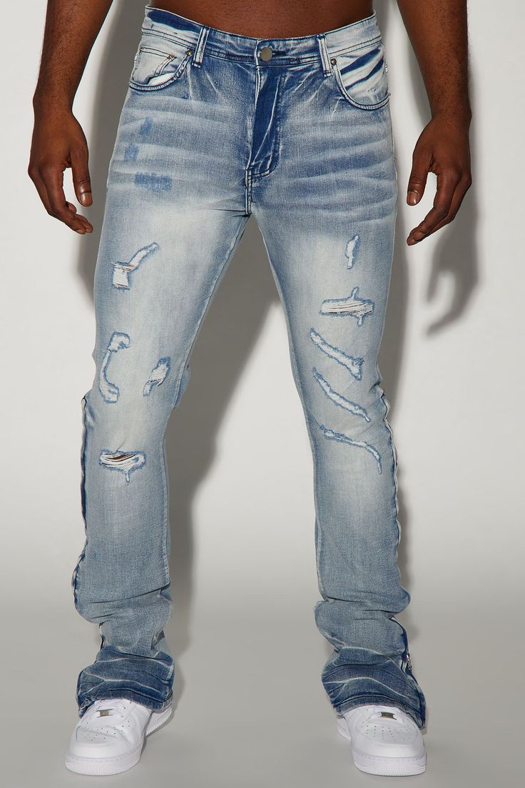 Available In Medium Wash. Stacked Skinny Flare Fit Stretch Denim 70% Cotton 28% Polyester 2% Spandex Disclaimer: Due To The Distressing Process, & Wash Process, Each Garment Is Unique. Zip Fly Button Closure 5 Pocket Detail Ankle Zipper Drop Imported | Mens Stand Out Stacked Skinny Flare Jeans in Medium Wash size 36 by Fashion Nova Fitted Distressed Jeans For Spring, Spring Distressed Fitted Jeans, Ripped Fitted Cotton Jeans, Fitted Light Wash Distressed Jeans, Fitted Ripped Cotton Jeans, Distressed Fitted Medium Wash Jeans, Distressed Fitted Jeans In Medium Wash, Fitted Distressed Denim Blue Jeans, Ripped Stretch Jeans For Streetwear