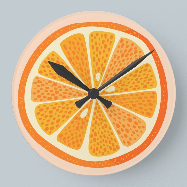 an orange clock with black hands on a white background and the words citrus written below it