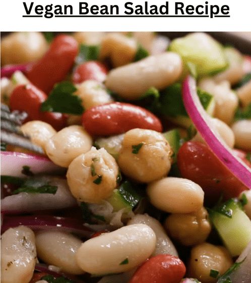 a close up view of a salad with beans and onions