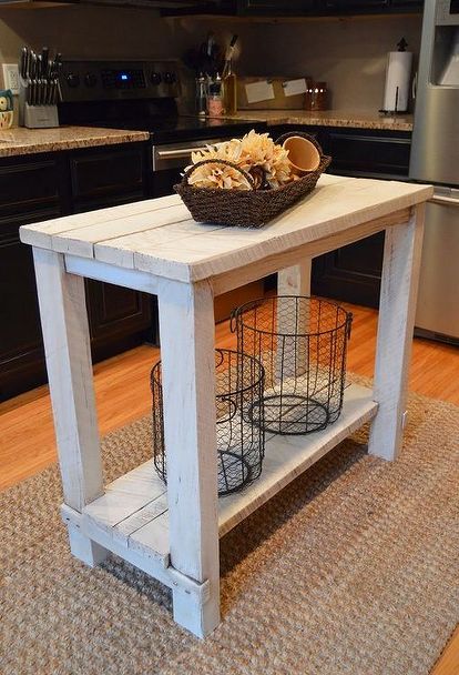 a kitchen island made from an old table