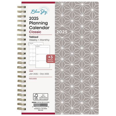 a spiral bound planner book with the cover open to show an image of a geometric pattern