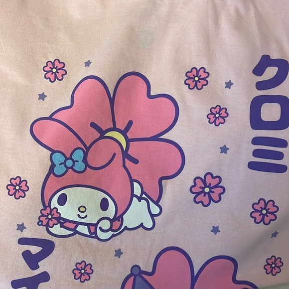 Pink Hello Kitty Friends My Melody And Kuromi T-Shirt In Pristine Brand New Condition. Pink Crew Neck T-shirt With Cute Design, Cute Pink T-shirt With Funny Print, Cute Pink T-shirt With Cartoon Print, Pink Funny Print Kawaii Tops, Pink Kawaii Top With Funny Print, Purple Kawaii Short Sleeve T-shirt, Purple Cotton Kawaii Top, Cute Cartoon Print Tops, Purple Short Sleeve Kawaii T-shirt