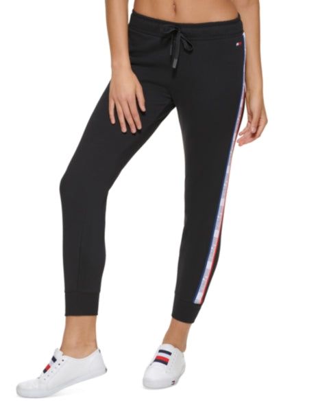 Classic slim fit terry joggers from Tommy Hilfiger, ideal for anything training throws at you. Featured in a pull-one style and finished with classic logo taping at the sides. High rise; approx. inseam: 28-1/2" INSPIRED for: Training Smocked pull-on waistband; drawstring at waistband; logo tape at sides; ribbed cuffs Cotton/polyester Machine washable Imported Paisley Pants, Pants Collection, Slim Fit Joggers, Black Fitness, Le Suit, 50 Style, Active Wear Pants, Classic Logo, Matching Family Outfits